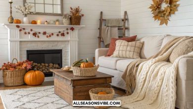 Warm and cozy fall decorating ideas for living room with neutral tones, pumpkins, and layered textures