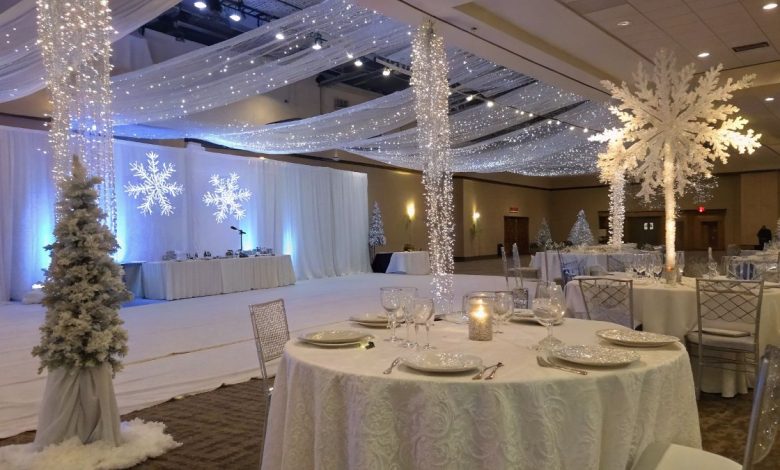 elegant winter wonderland party setup with snowy décor and twinkling lights