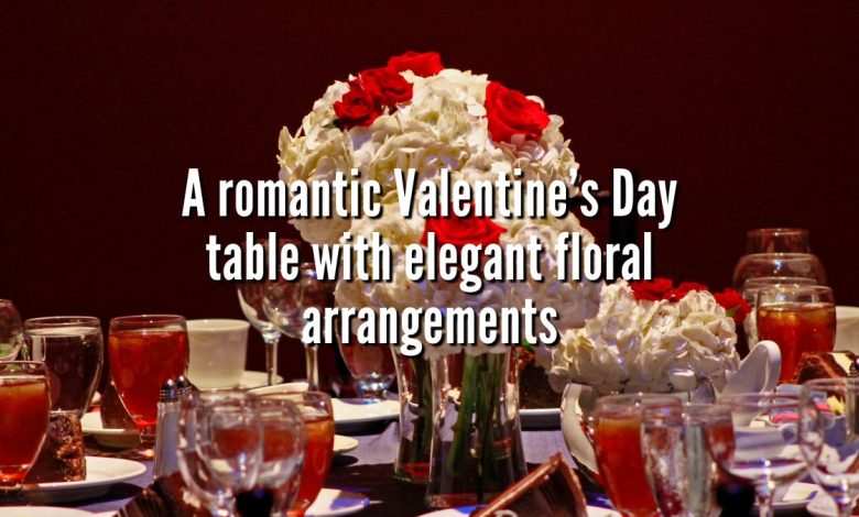 A romantic Valentine’s Day table with elegant floral arrangements and creative handmade centerpieces