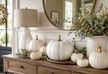 elegant white pumpkin decor on entryway table