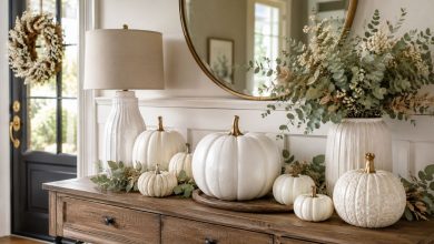 elegant white pumpkin decor on entryway table