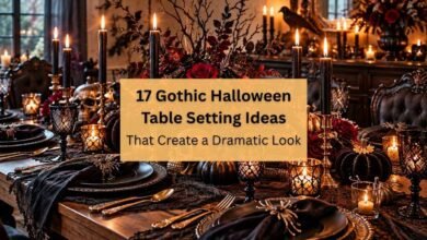Elegant gothic Halloween table setting with black plates, candles, and dark floral centerpiece